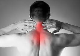 Person with pain in their neck and upper back